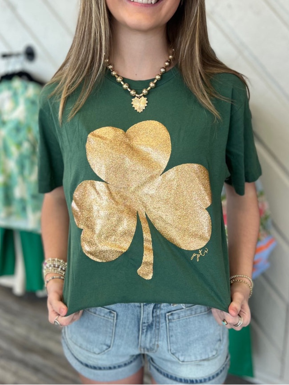 Women's Green Short Sleeve Tee with Gold Shamrock Graphic